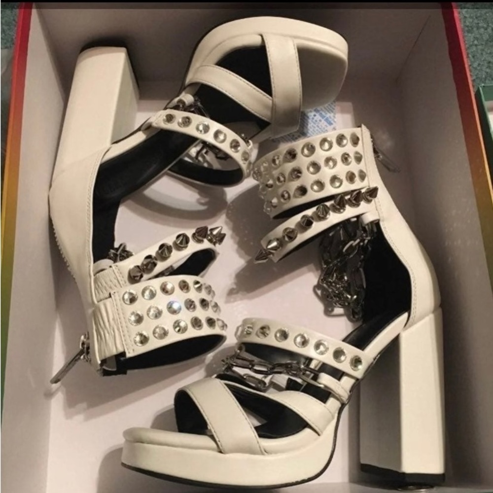 Dare Devil white faux leather high heels.